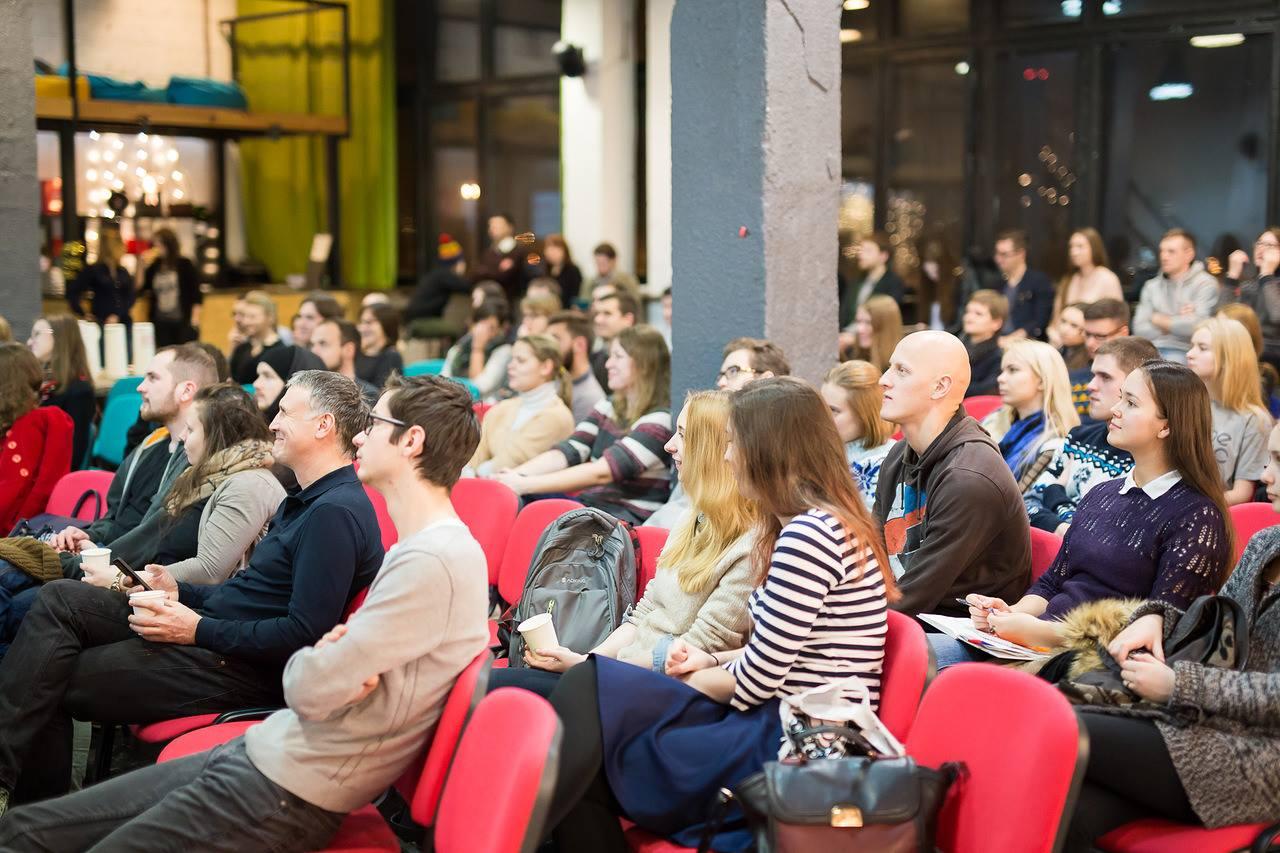 Meetup participants attentively listen to the PRAS Art Director's presentation